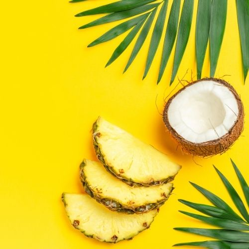 Easy pineapple dessert topped with whipped topping and fresh mint